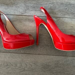 Red patent leather platforms